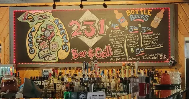 Hand-painted bottle beer board over the back bar